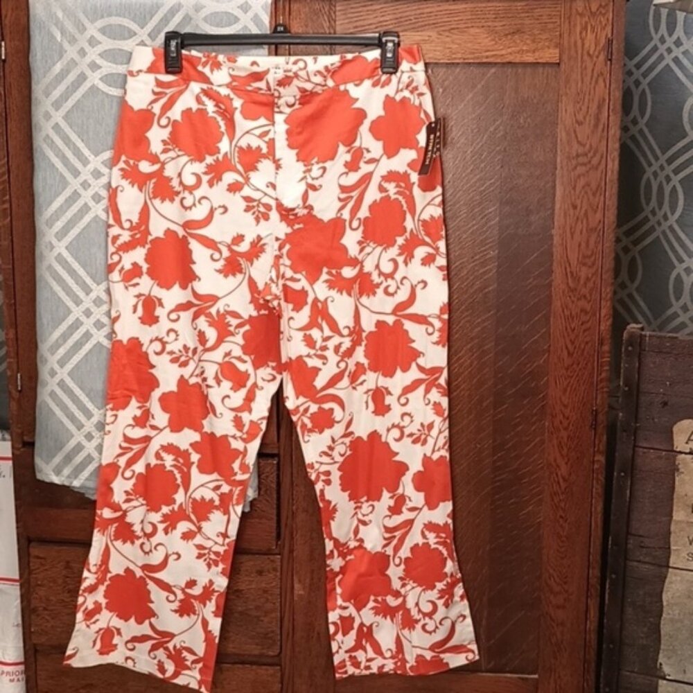 M7 NWT. Orange and cream floral slacks 18
